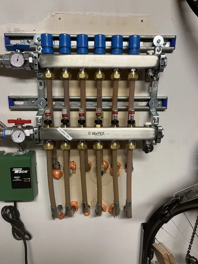 Plumber performing Water Heater Repair at a residential property in Northborough